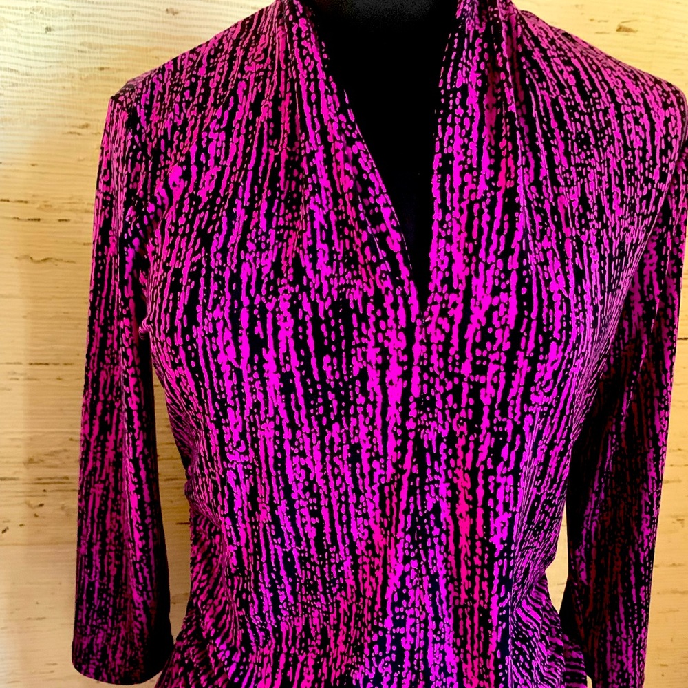 Vince Camuto top in large shocking pink with black design.